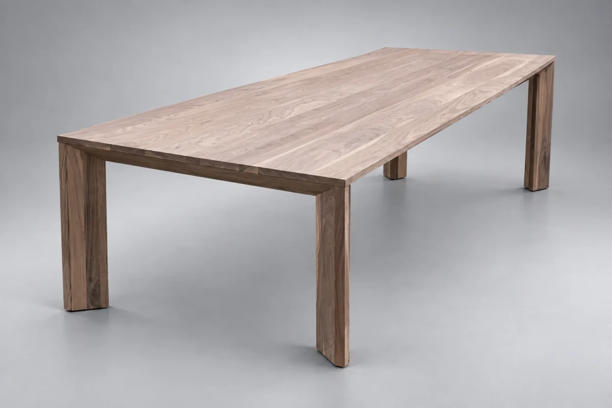 Custom 1090 dining table on a silver studio background